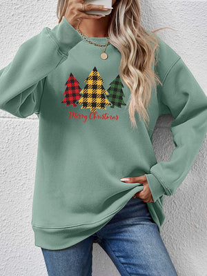 Sage green crewneck sweatshirt with plaid Christmas trees graphic and Merry Christmas text.