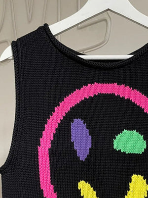 Black knit tank top with colorful smiley face graphic and round neckline.