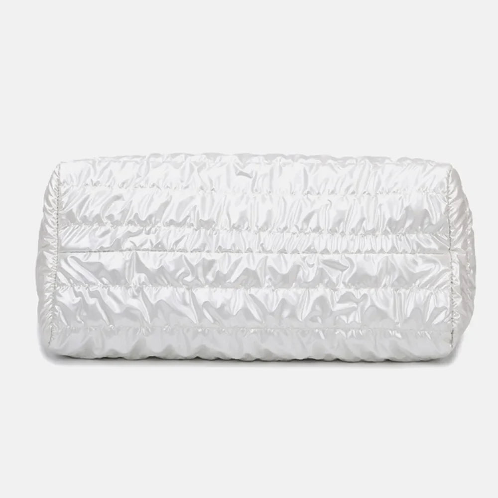 Glossy white padded weekend holdall with ruched detailing.