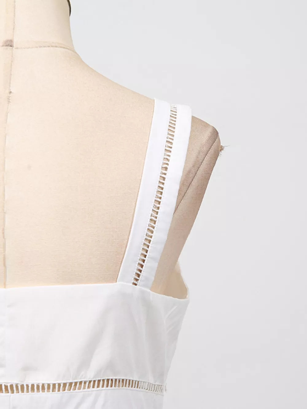 White midi dress with eyelet embroidery on straps and hem