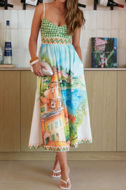Gingham bodice midi dress with scenic Italian print skirt, sweetheart neckline, and spaghetti straps.