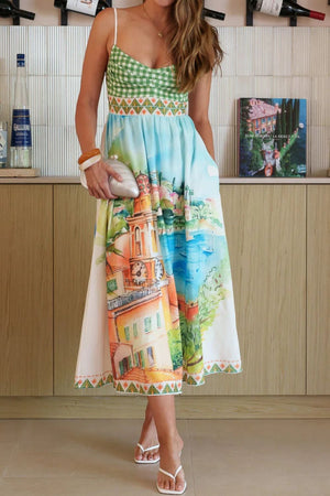 Gingham bodice midi dress with scenic Italian print skirt, sweetheart neckline, and spaghetti straps.