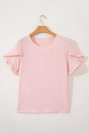 Blush pink polyester short sleeve blouse with ruffle trim on sleeves