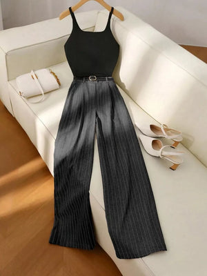 Chic sleeveless top and dark gray pinstripe wide-leg pants set with belt