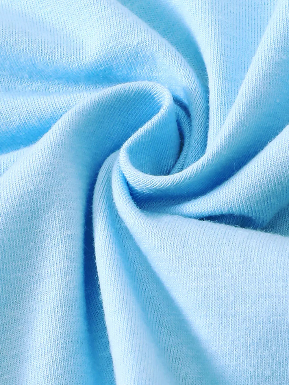 Light blue cotton fabric detail of a baby outfit