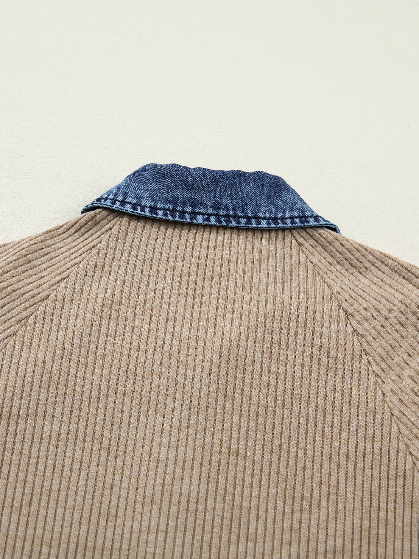 Cozy ribbed knit shirt in tan with a denim collar detail.