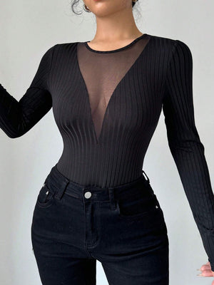 Black ribbed bodysuit with plunging sheer mesh neckline and long sleeves.