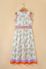 Sleeveless floral print dress with purple and orange trim and a belted waist.