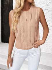 Pink cable knit sweater vest with a notched neckline and ribbed trim.