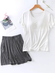 White short sleeve pajama top and heather gray shorts with pockets and elastic waistband