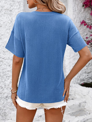 Blue ribbed V-neck t-shirt with short sleeves and a pocket detail.