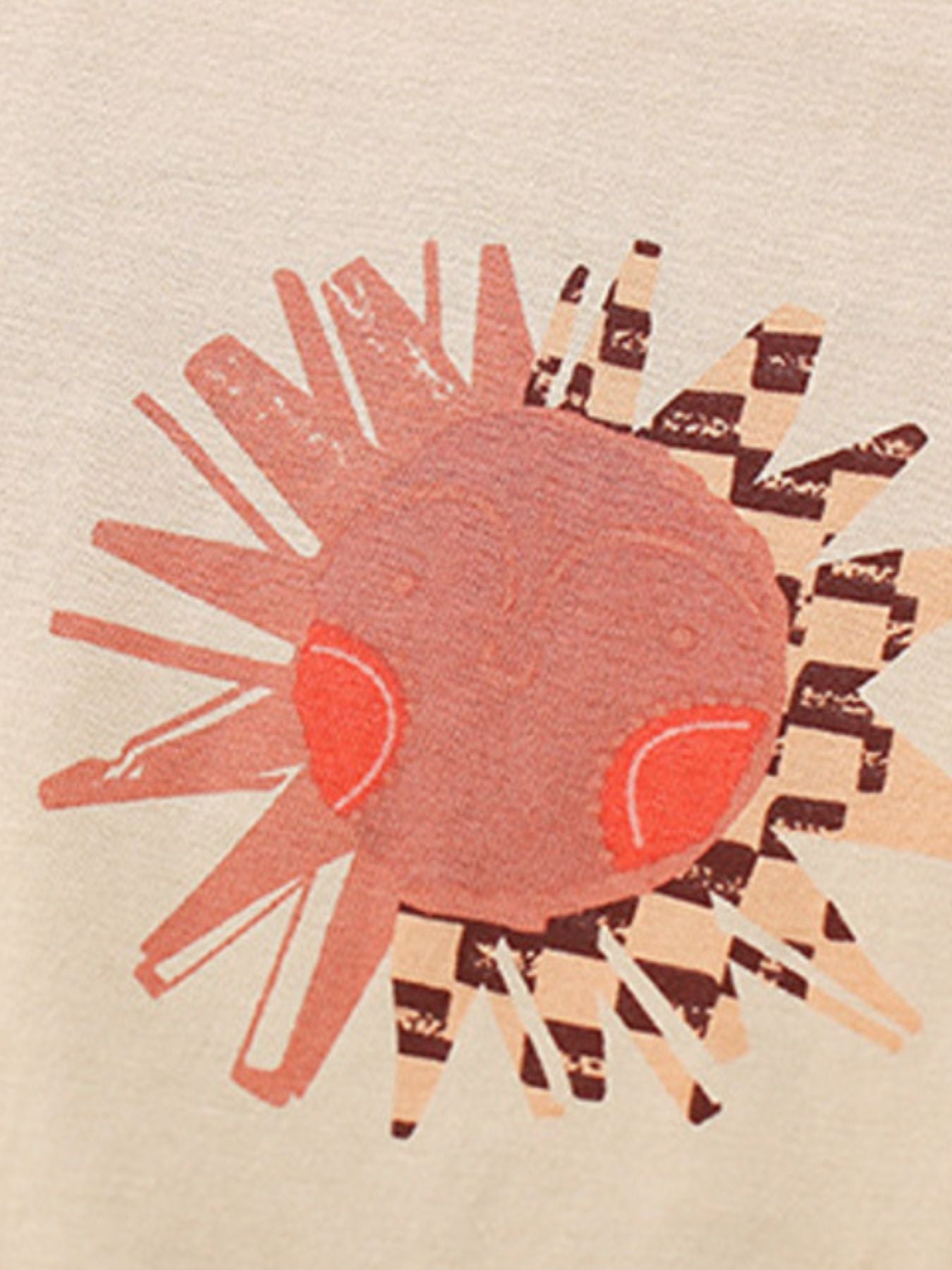 Toddler graphic tee with a pink sun graphic and checkered pattern detail.