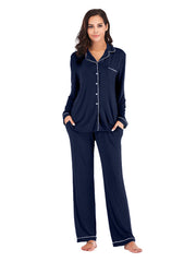 Navy piped trim pajama set with long sleeves, button front, and pockets.