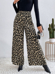 Leopard print palazzo trousers with a high elastic waist, wide leg and full length.