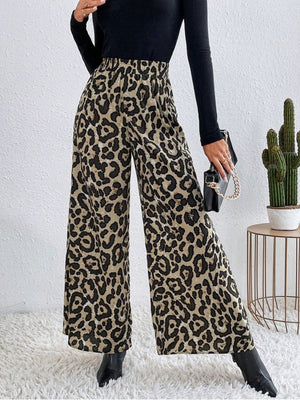 Leopard print palazzo trousers with a high elastic waist, wide leg and full length.