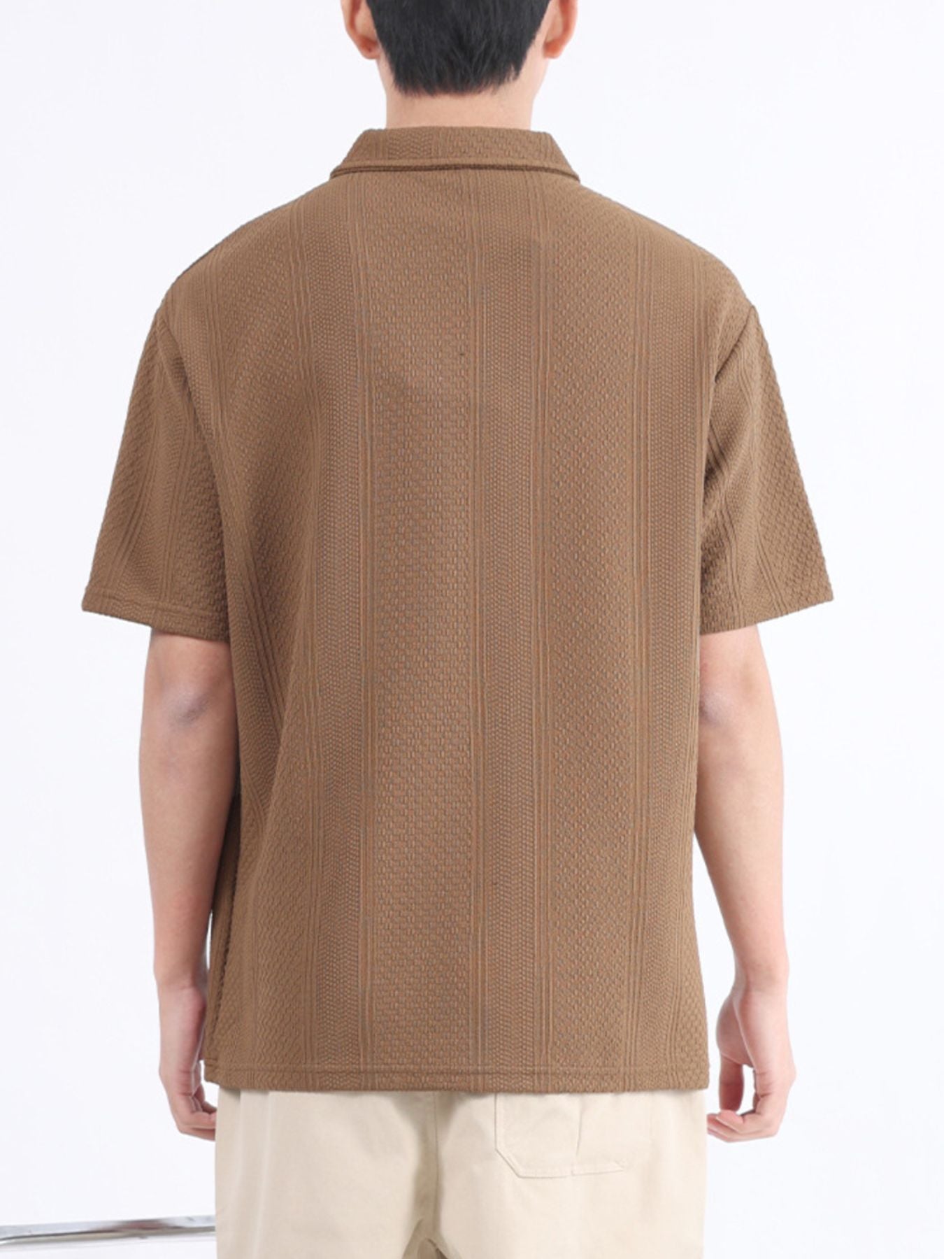 Desert Color textured polo shirt with short sleeves and a collared neckline.