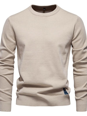 Khaki crew neck knit sweater with ribbed cuffs and hem.