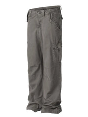 Gray distressed utility wide-leg cargo pants with frayed pocket details.