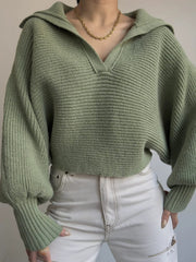 Army green knit sweater with wide collar and balloon sleeves.