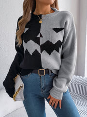 Split-Face Pumpkin Knit Sweater in gray and black acrylic with a zigzag pattern.