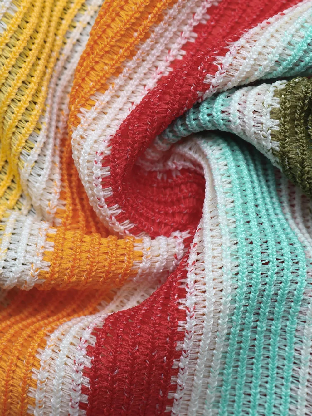 Vibrant striped bodycon midi dress in yellow, orange, red, white, mint, and green knit fabric.
