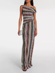 Vibrant one-shoulder maxi dress with chevron pattern and asymmetrical neckline.