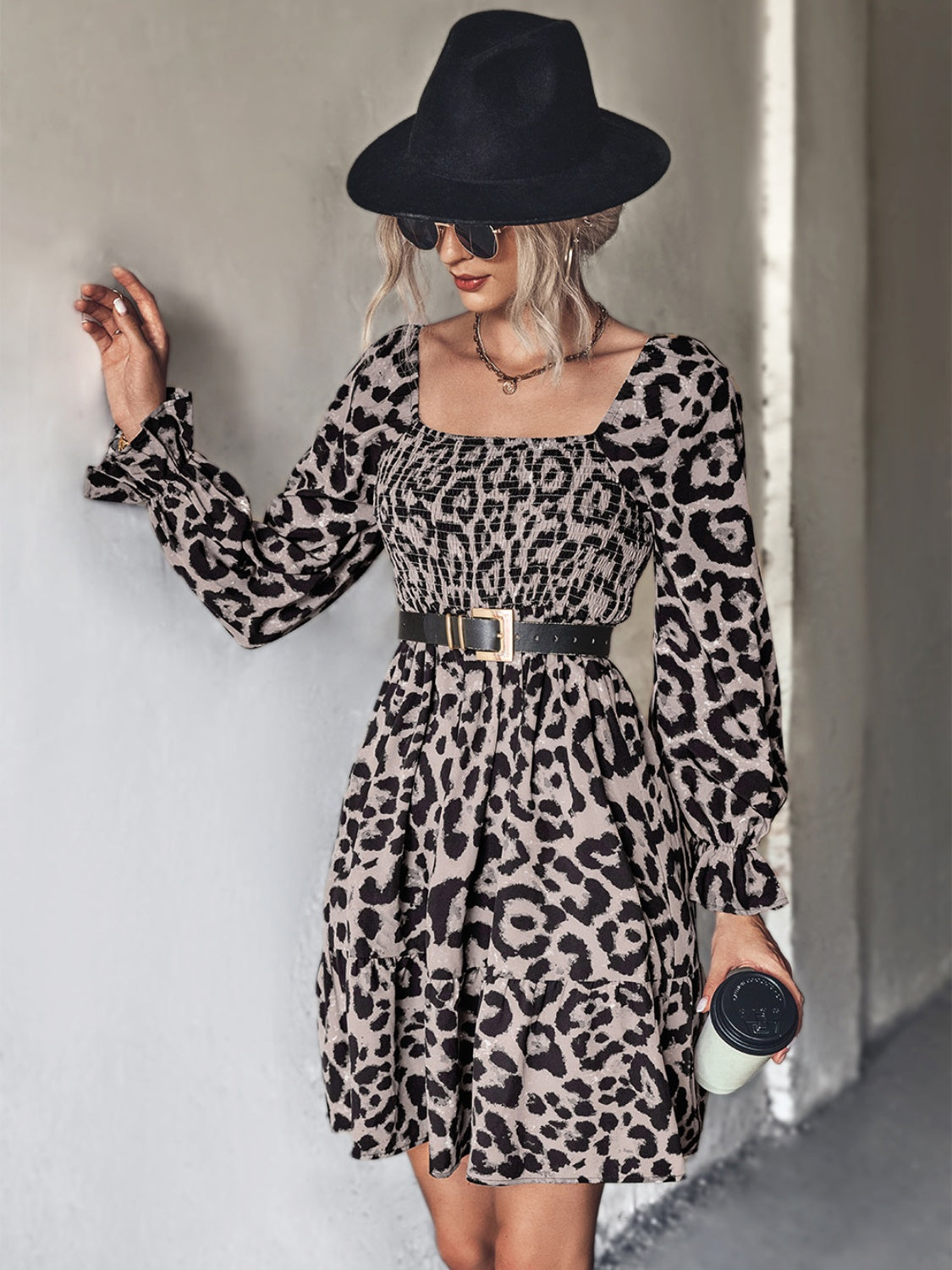 Smocked bodice leopard print mini dress with square neck and ruffled cuffs