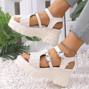 White woven texture high wedge sandals with adjustable buckle straps and chunky platform sole.