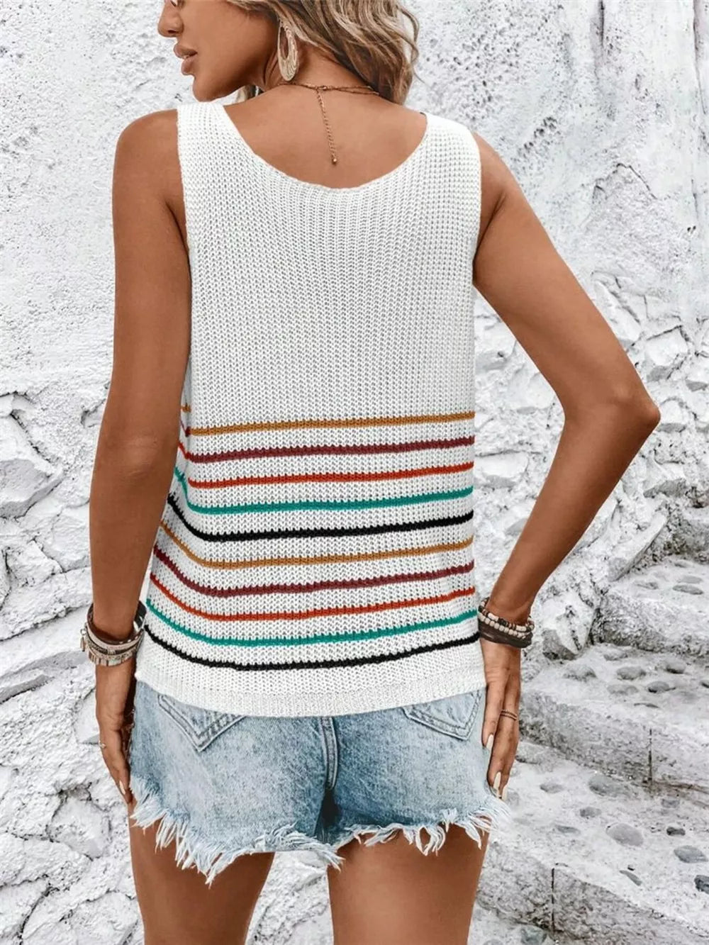 Chic striped knit vest with V-neck and colorful horizontal stripes.