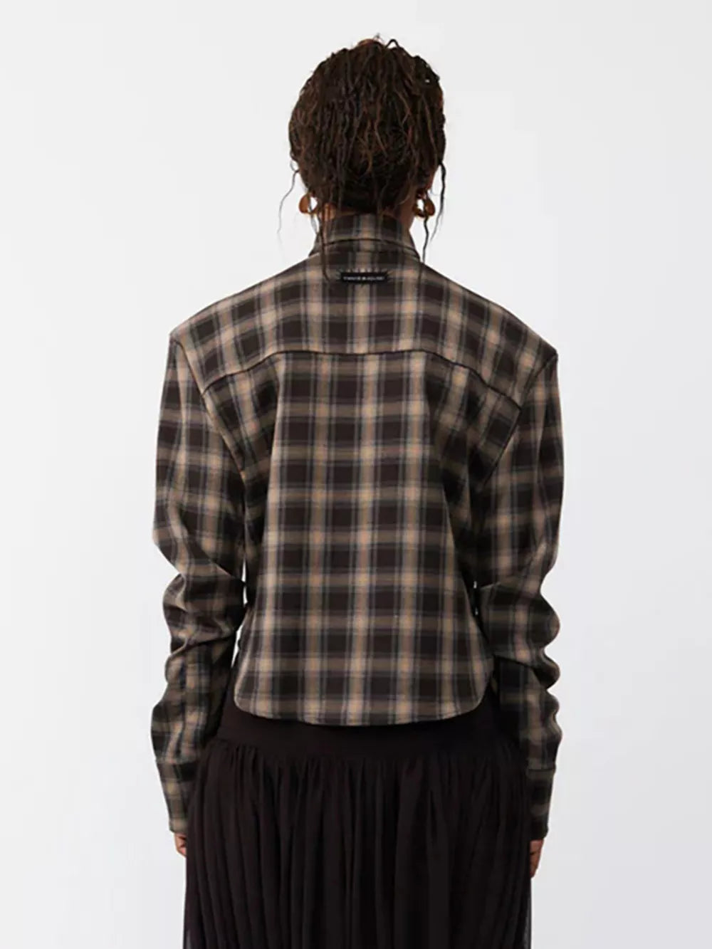 Chic ruched plaid long sleeve shirt with buttoned cuffs, shown from the back.