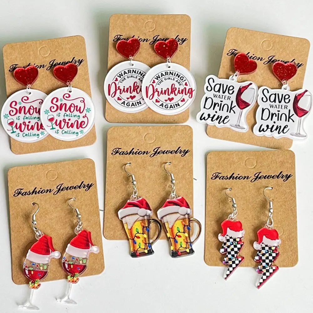 Festive acrylic novelty drop earrings with heart tops and various holiday designs.