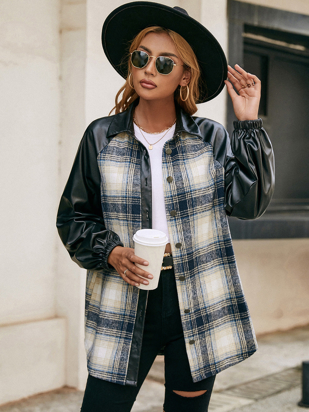 Plaid & faux leather raglan shacket with buttoned front and elastic cuffs.