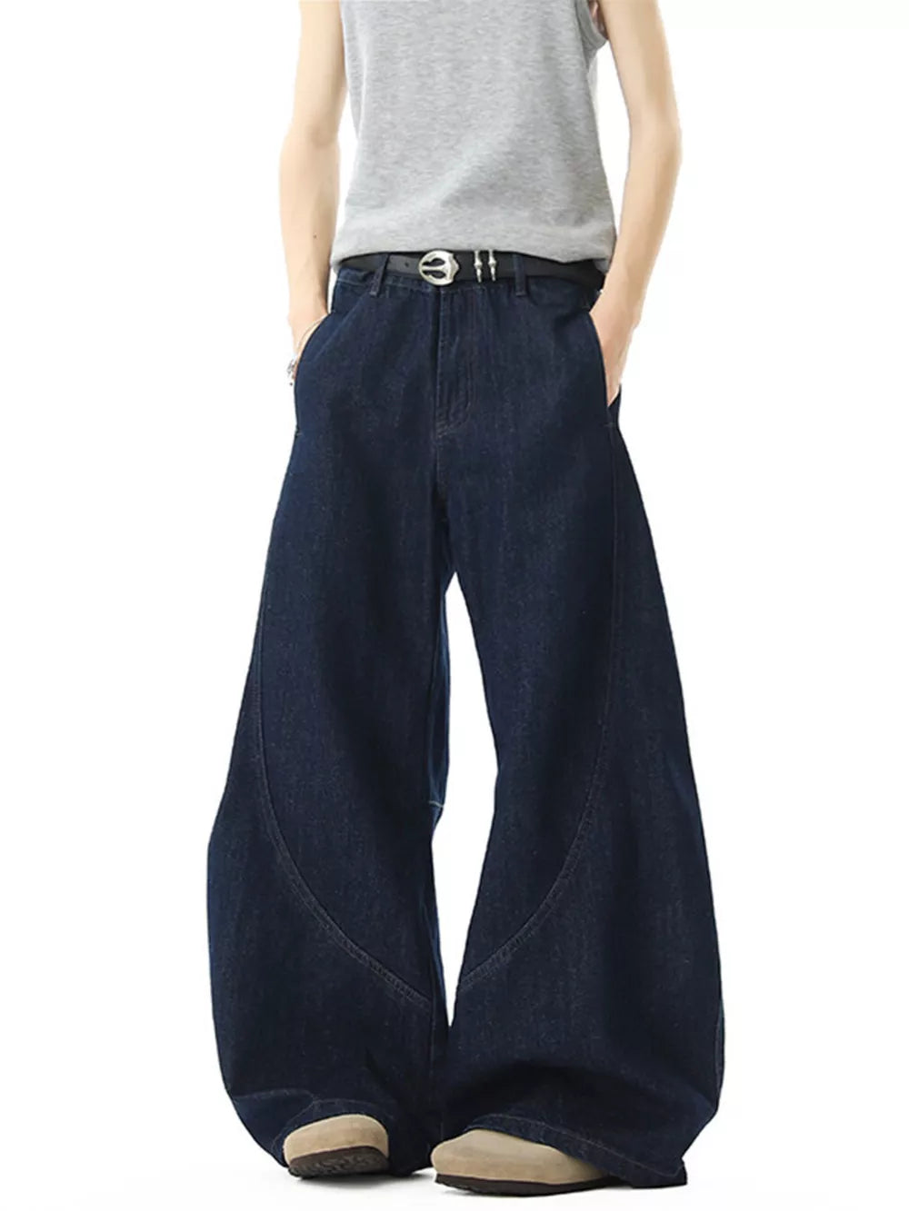 Men's dark wash cotton wide-leg jeans with pockets and a relaxed fit.