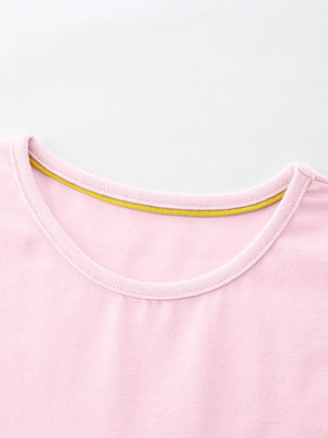 Pink cotton toddler dress with yellow trim at the neckline.