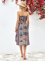 Printed bandeau midi dress with asymmetric hem and belt in blue and orange.