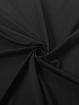 Black asymmetrical ruched mini dress fabric detail