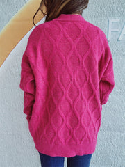 Hot Pink sparkle knit sweater with diamond cable pattern and relaxed fit.