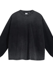 Vintage wash oversized crewneck sweatshirt in black with distressed hem and neckline.