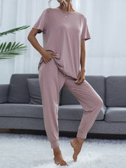 Lilac relaxed-fit tee with pockets and cuffed jogger pants.