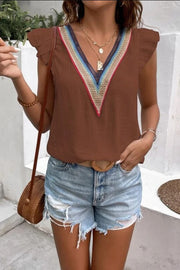 Brown flutter sleeve blouse with colorful embroidered V-neck trim.