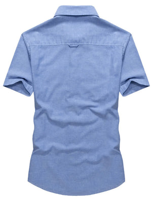 Men's sky blue short sleeve cotton button-down shirt with back yoke detail.