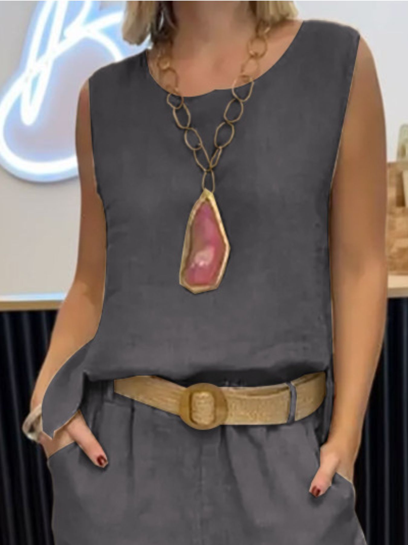 Grey relaxed fit tank and wide-leg pants set with a statement necklace and belt.
