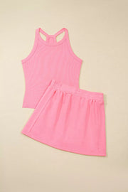 Pink ribbed cropped tank top and elastic waist skort set.