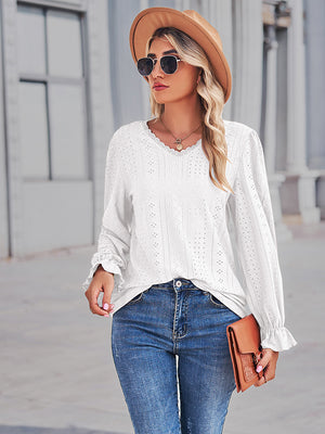White lace trim eyelet blouse with ruffle cuffs and V-neck.