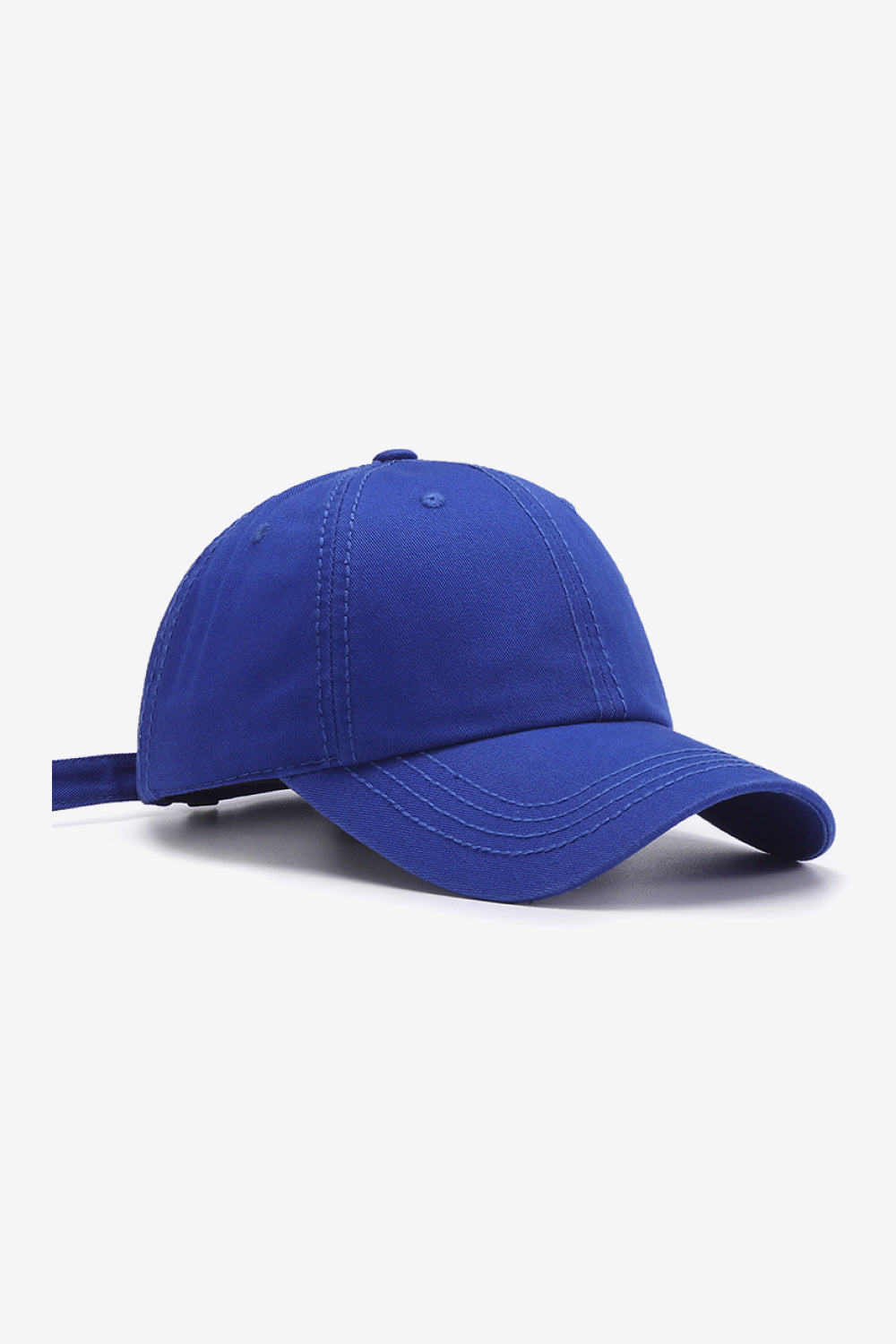 Cobalt canvas baseball cap with adjustable strap and stitched details.