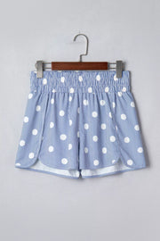 Blue and white polka dot striped shorts with elastic waist and side slits.