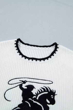 White ribbed sweater vest with black rodeo graphic and contrast trim neckline.