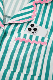 Pajama set with teal and white stripes, pink ric-rac trim on collar and pocket.