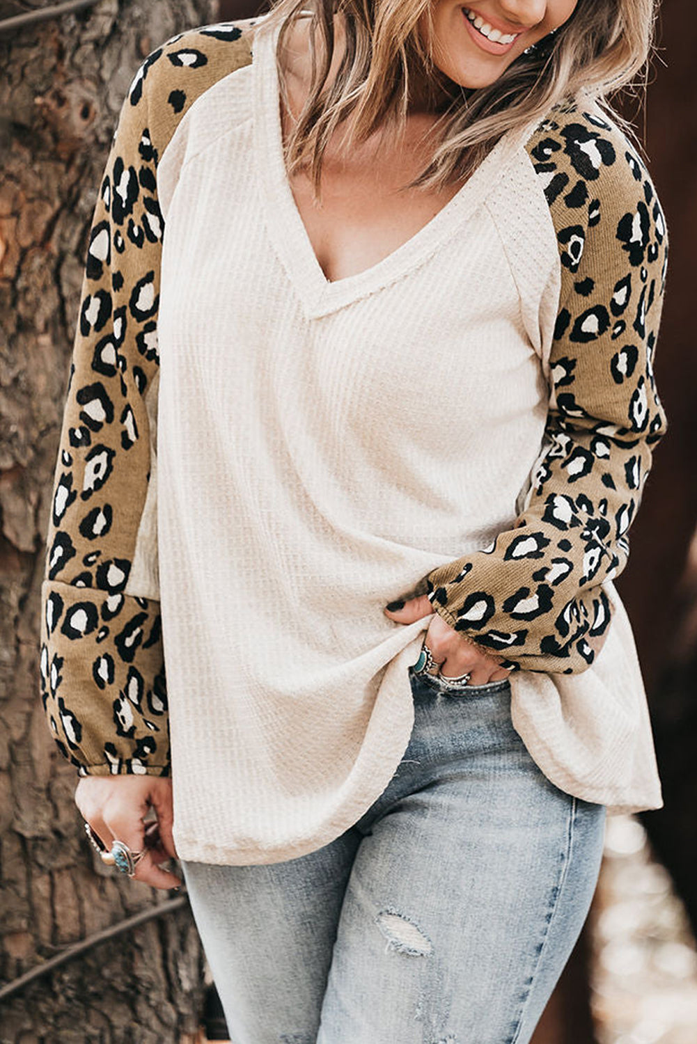 White waffle knit v-neck top with leopard print sleeves