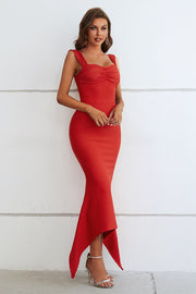 Red ruched bustier gown with asymmetric hemline and spaghetti straps.